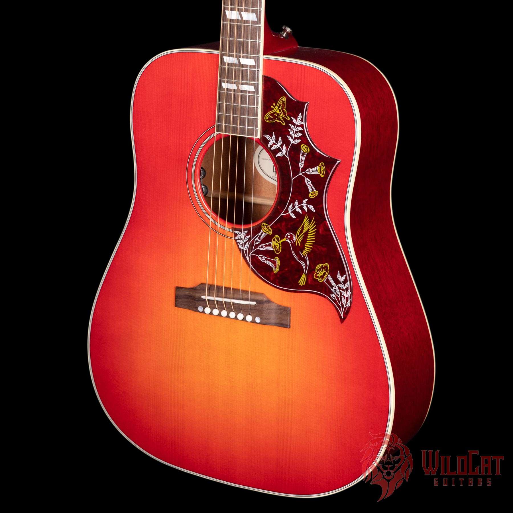 cherry burst acoustic guitar